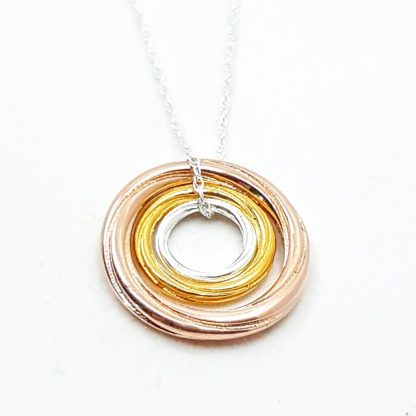 Silver and gold triple pendant