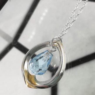 Silver and gold Topaz pendant