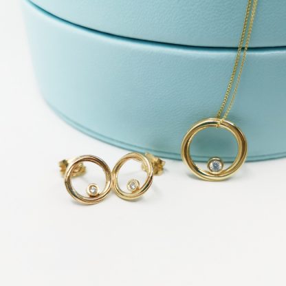 diamond and gold necklace and earring set