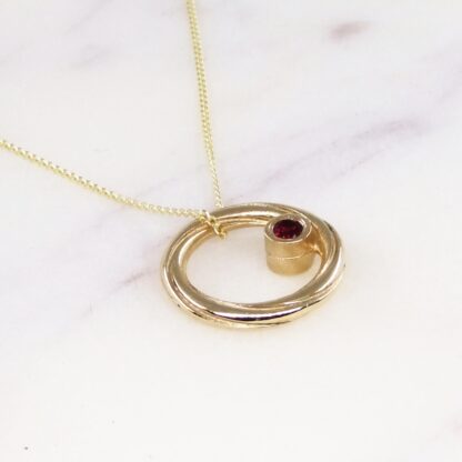 double facing pendant gold with diamond and ruby