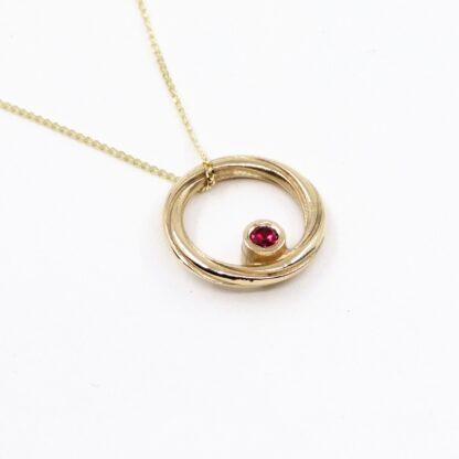 double facing pendant gold with diamond and ruby