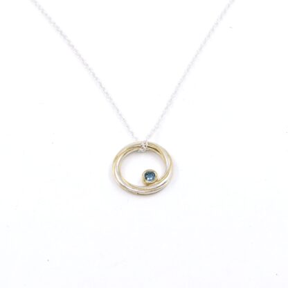 Silver and topaz pendant