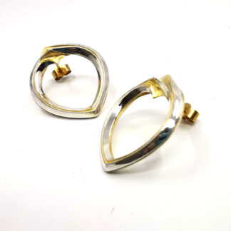 Handcrafted heart twist stud earrings in silver, gilt or contrast finishes, designed and made in Birmingham’s Jewellery Quarter.